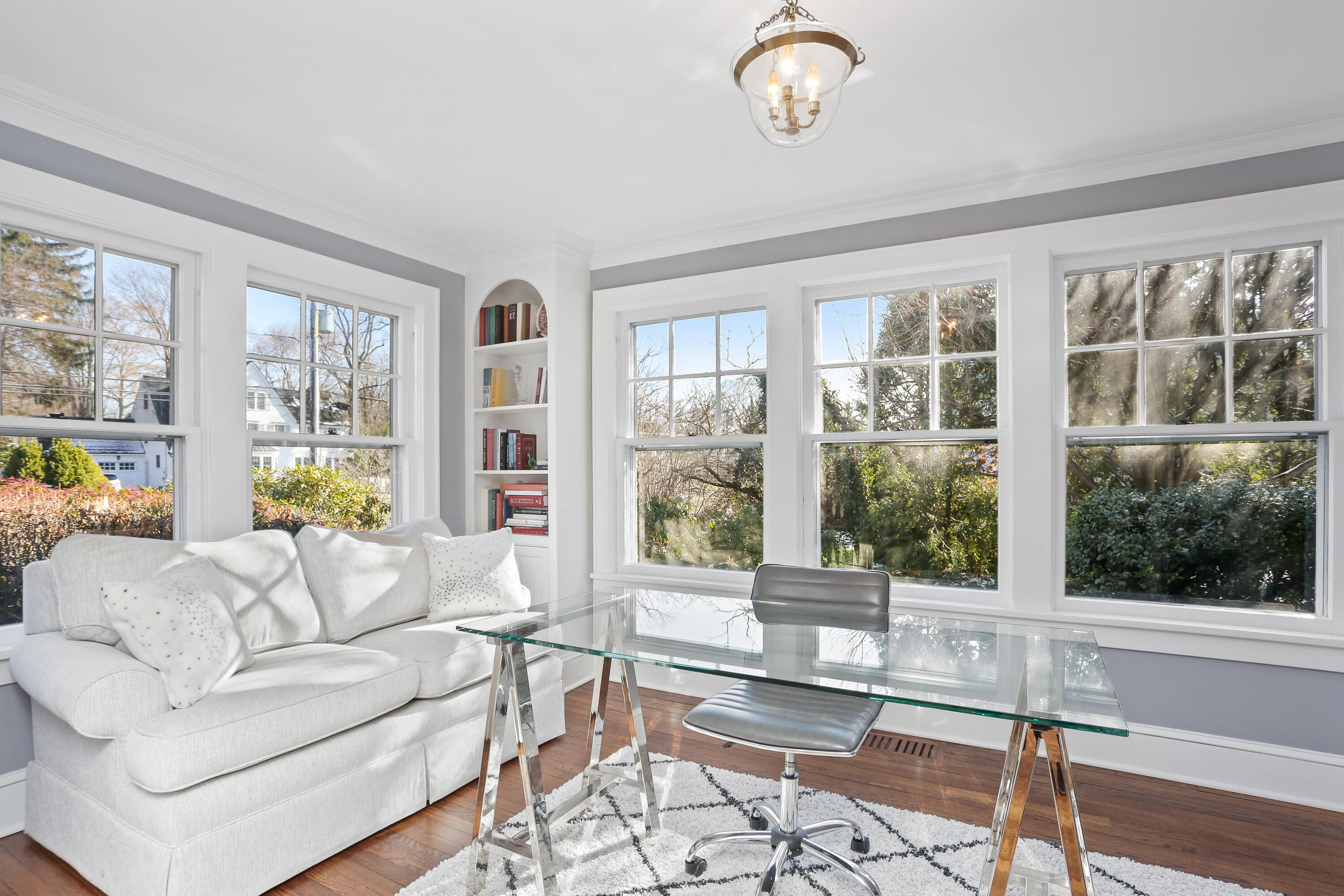 8 Beach Drive Darien, CT 06820 - Photo 6 of 27 a living room with furniture and a large window
