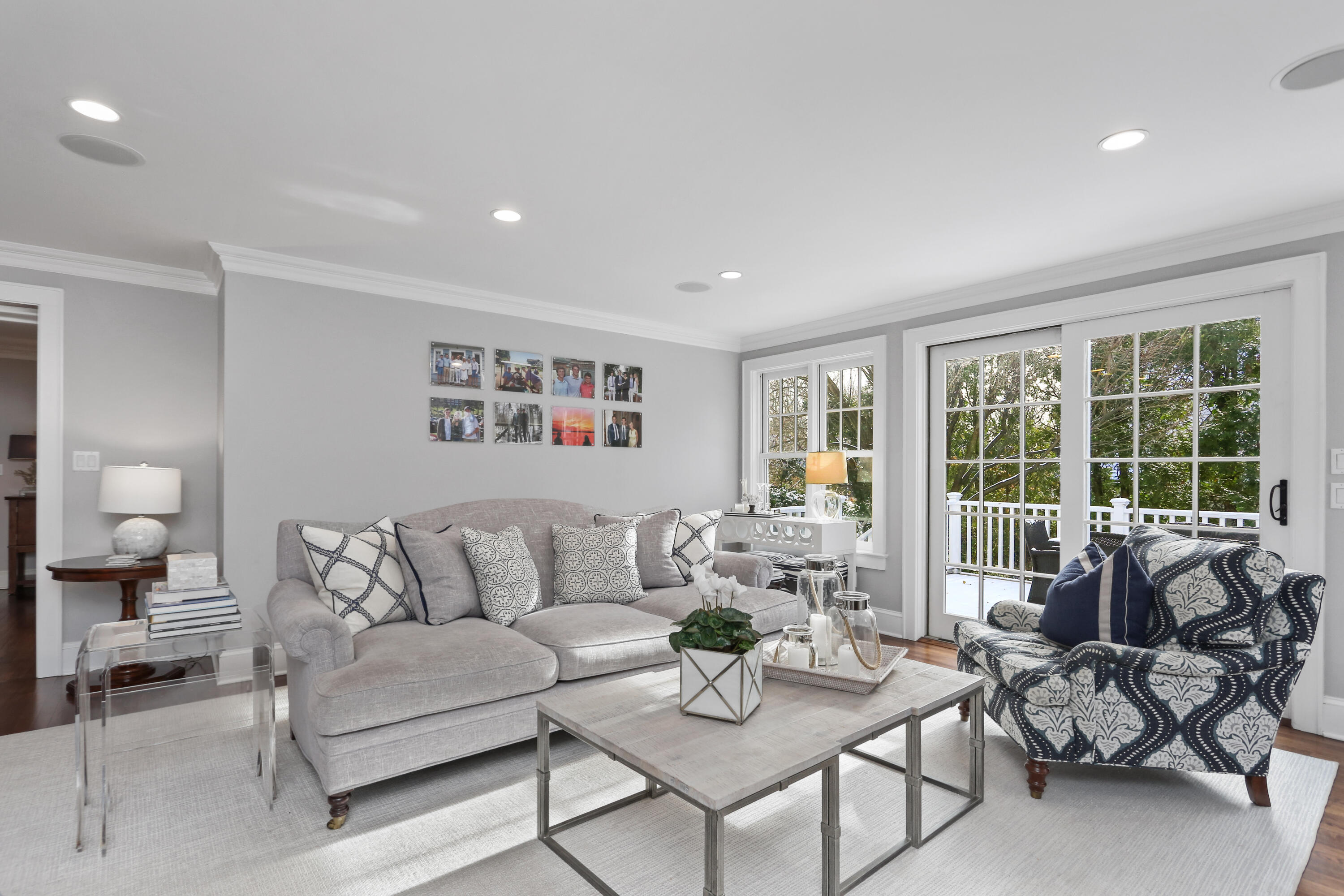 8 Beach Drive Darien, CT 06820 - Photo 8 of 27 a living room with furniture and a large window