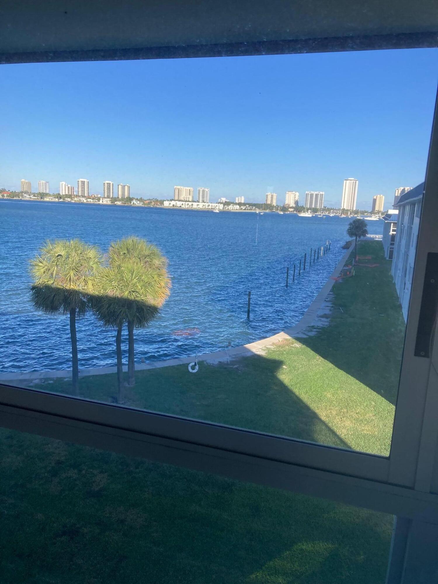 2936 Lake Shore Drive, Unit 409 Riviera Beach, FL 33404 - Photo 2 of 10 Balcony/Patio Direct Intracoastal Views