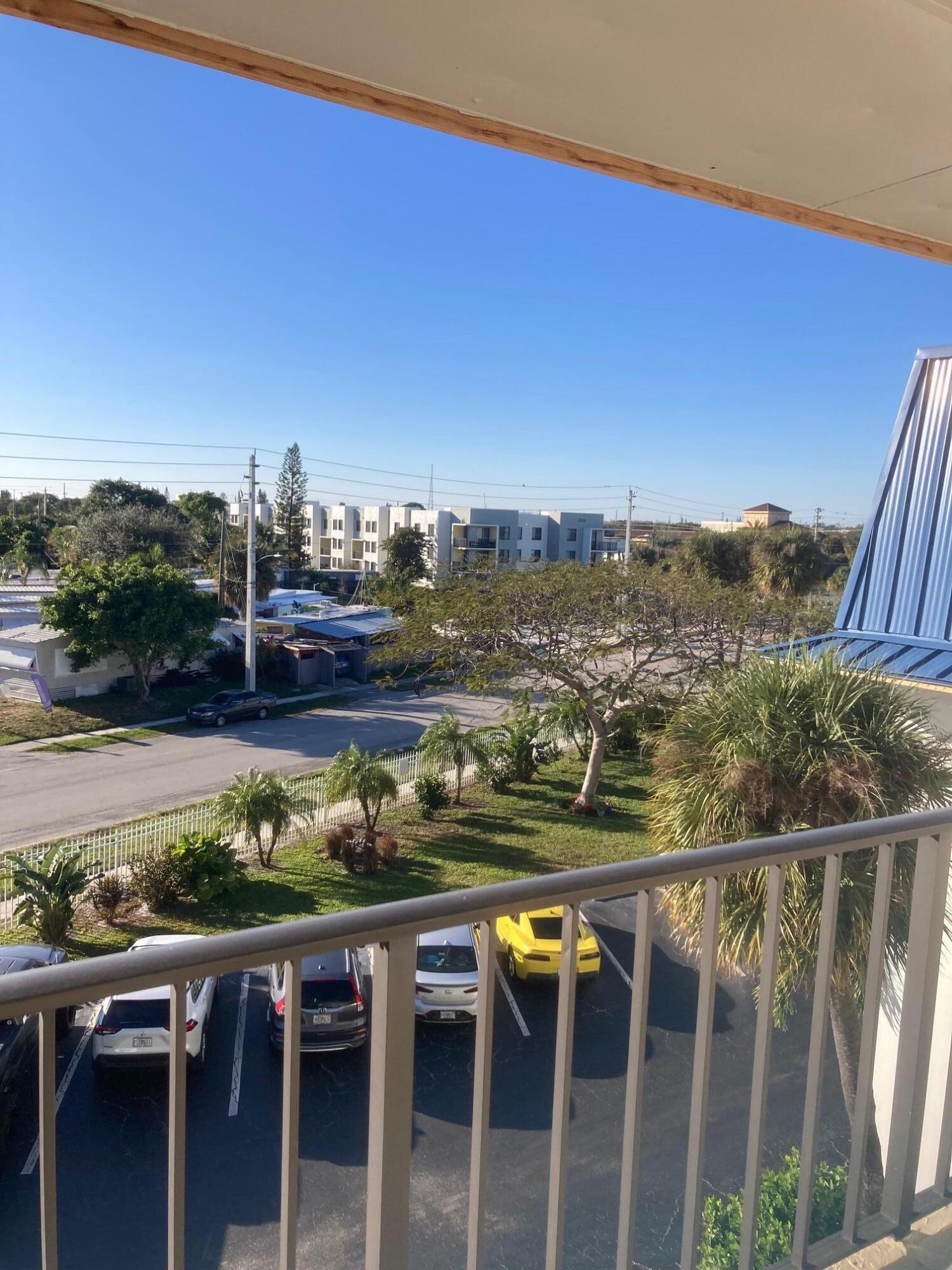 2936 Lake Shore Drive, Unit 409 Riviera Beach, FL 33404 - Photo 10 of 10 Front/Outside Door Area