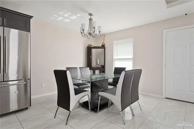 a kitchen with a sink stove and microwave