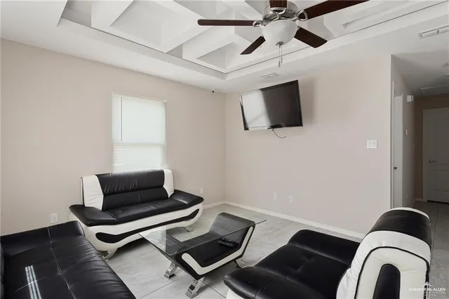 a kitchen with kitchen island a refrigerator sink and stove