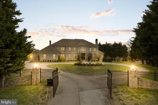 a view of a livingroom with furniture and a table wooden floor