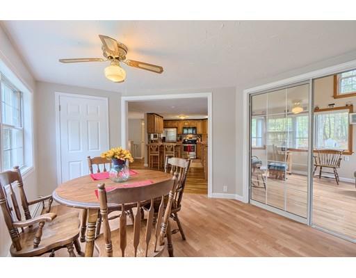 37 Governor Fuller Road Billerica, MA 01821 - Photo 12 of 27 a view of a dining room that has a table and chairs