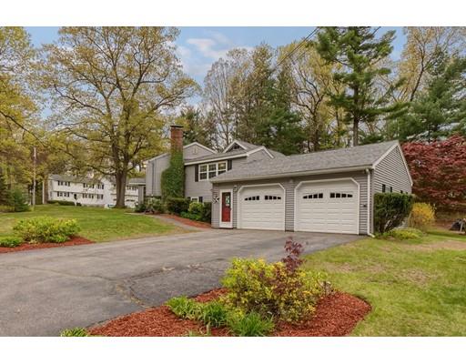 37 Governor Fuller Road Billerica, MA 01821 - Photo 2 of 27 a front view of a house with a yard and garage