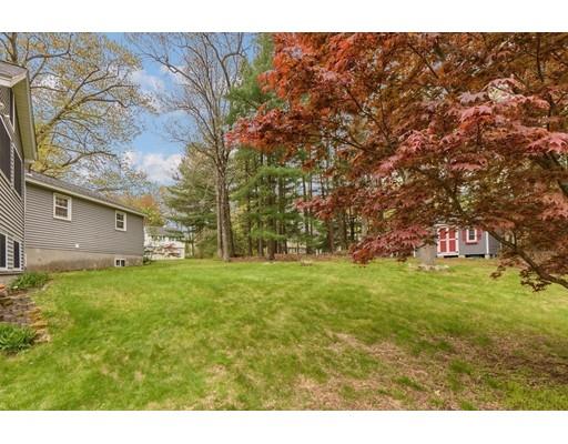 37 Governor Fuller Road Billerica, MA 01821 - Photo 27 of 27 a backyard of a house with lots of green space