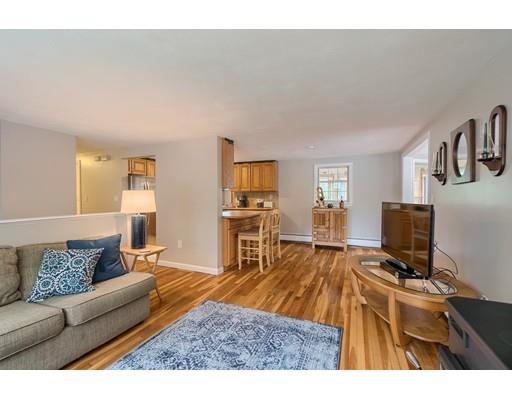 37 Governor Fuller Road Billerica, MA 01821 - Photo 6 of 27 a living room with furniture and a flat screen tv