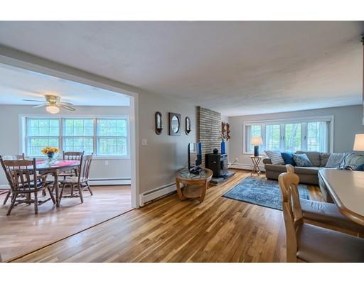 37 Governor Fuller Road Billerica, MA 01821 - Photo 10 of 27 a living room with furniture a wooden floor and next to a window