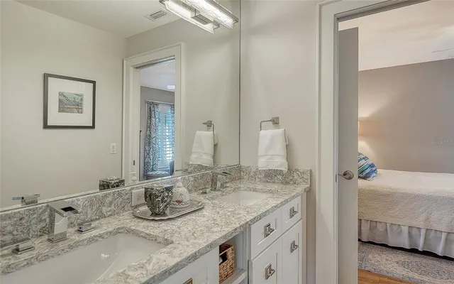 a view of a balcony with wooden floor
