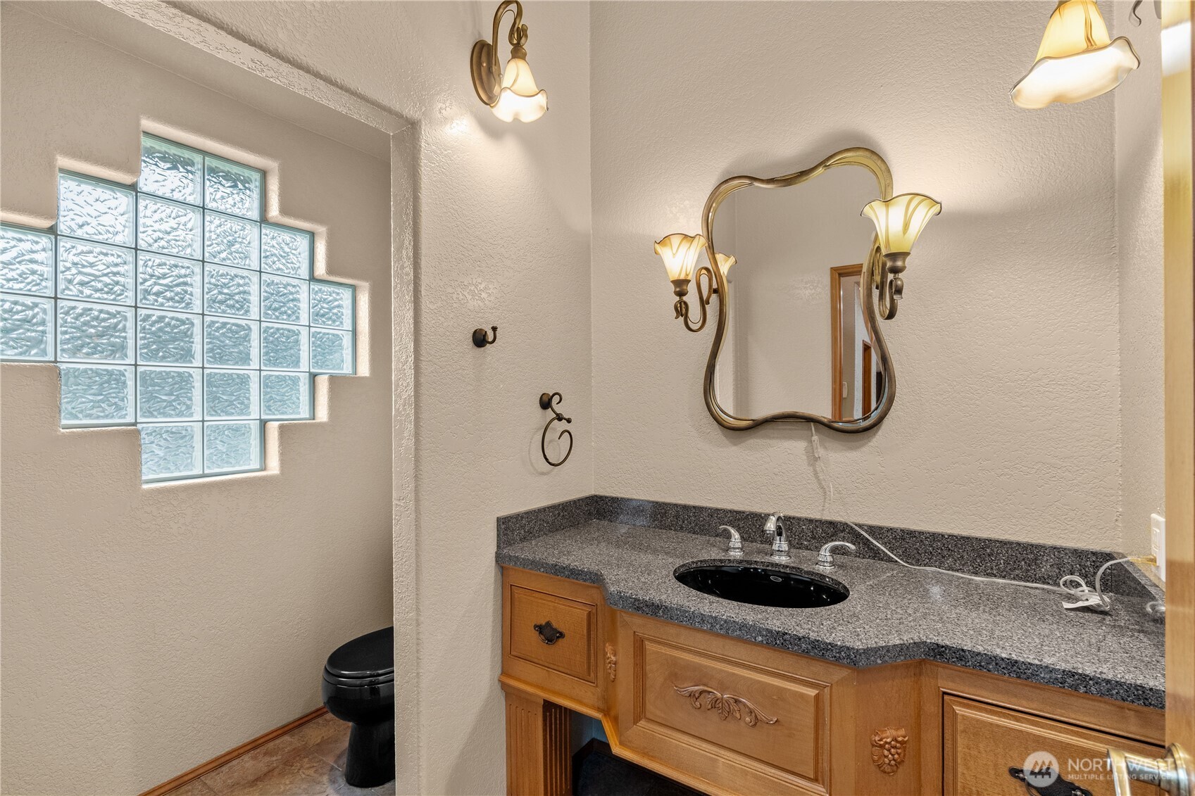 100 9th Street South Montesano, WA 98563 - Photo 18 of 40 a bathroom with a sink and a mirror