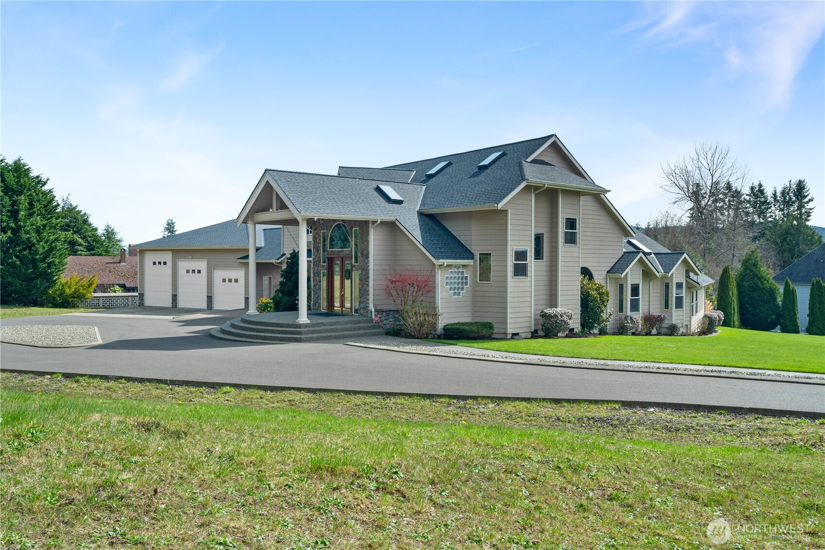 100 9th Street South Montesano, WA 98563 - Photo 2 of 40 a front view of a house with a yard