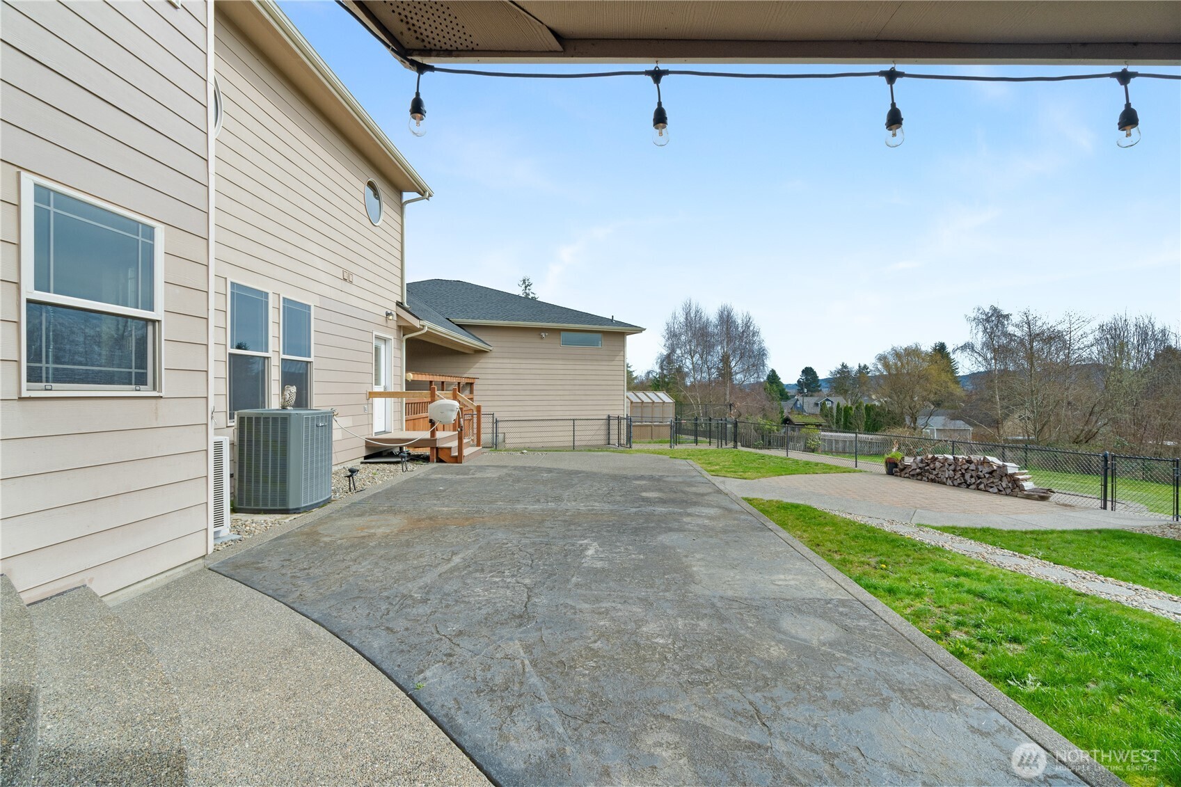 100 9th Street South Montesano, WA 98563 - Photo 35 of 40 a view of a house with backyard and trees