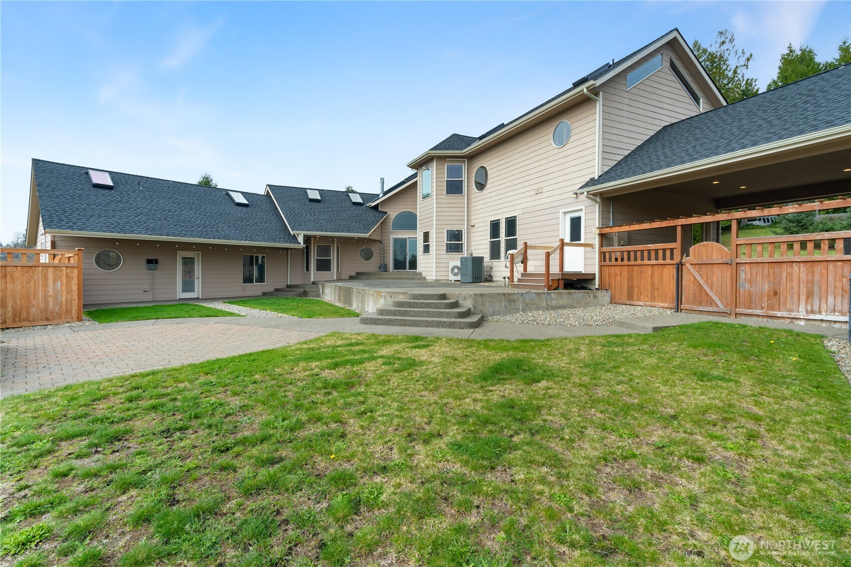 100 9th Street South Montesano, WA 98563 - Photo 36 of 40 a front view of a house with a garden and plants