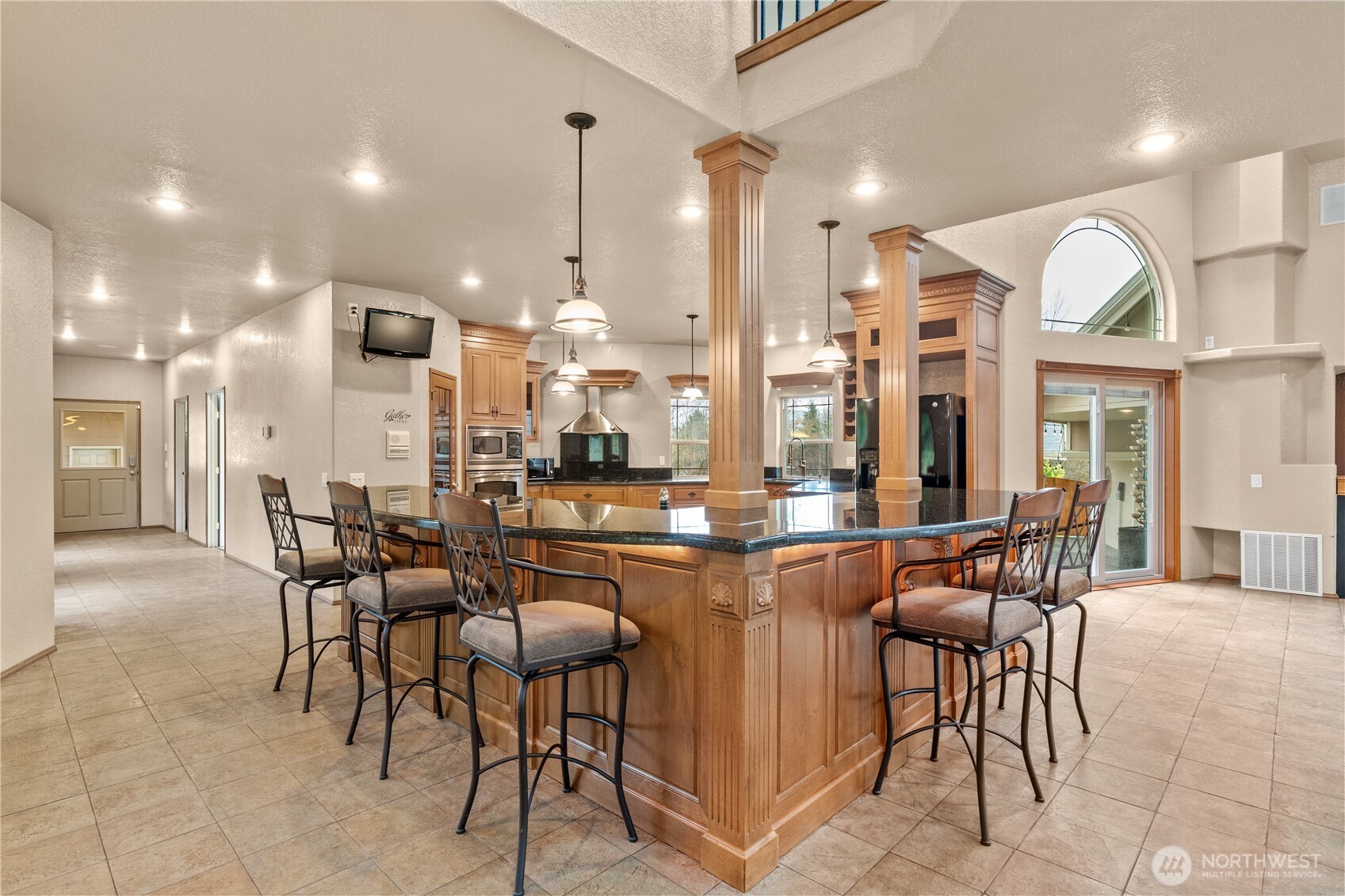 100 9th Street South Montesano, WA 98563 - Photo 5 of 40 a dining hall with stainless steel appliances kitchen island granite countertop a table and chairs
