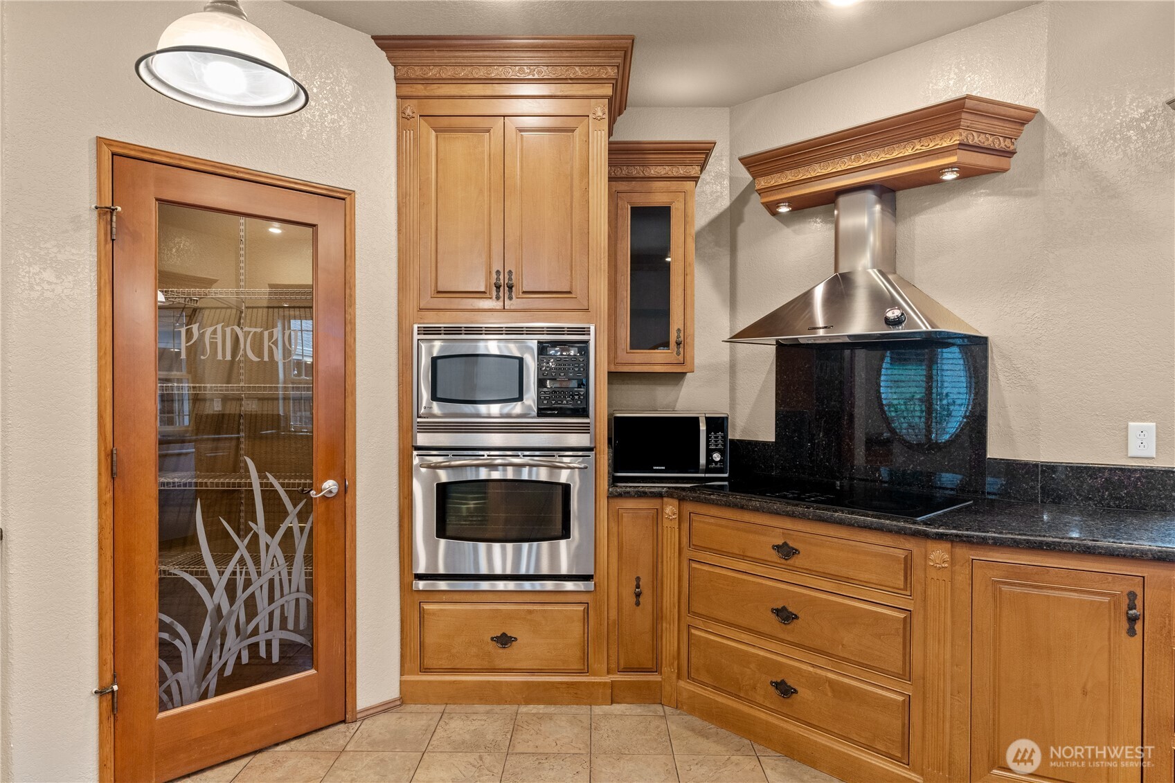 100 9th Street South Montesano, WA 98563 - Photo 7 of 40 a kitchen with stainless steel appliances a stove and a refrigerator