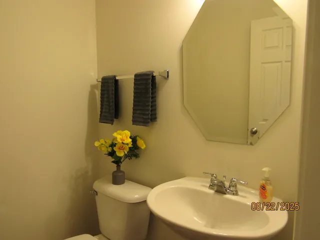 a bathroom with a sink and mirror