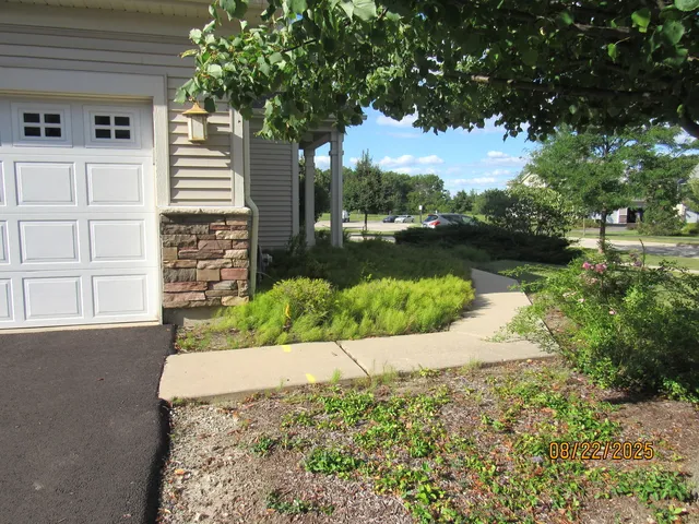 a view of a back yard of a house