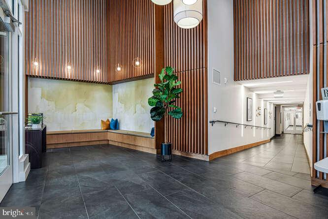 6803 Cameron Drive Northwest, Unit 314 Washington, DC 20012 - Photo 11 of 25 a view of livingroom and hardwood floor