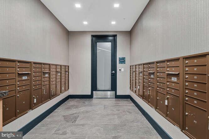 6803 Cameron Drive Northwest, Unit 314 Washington, DC 20012 - Photo 13 of 25 a view of empty room with wooden floor
