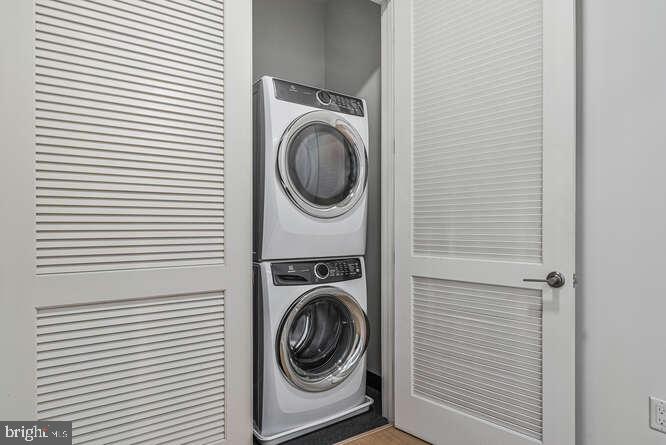 6803 Cameron Drive Northwest, Unit 314 Washington, DC 20012 - Photo 21 of 25 a utility room with dryer and washer