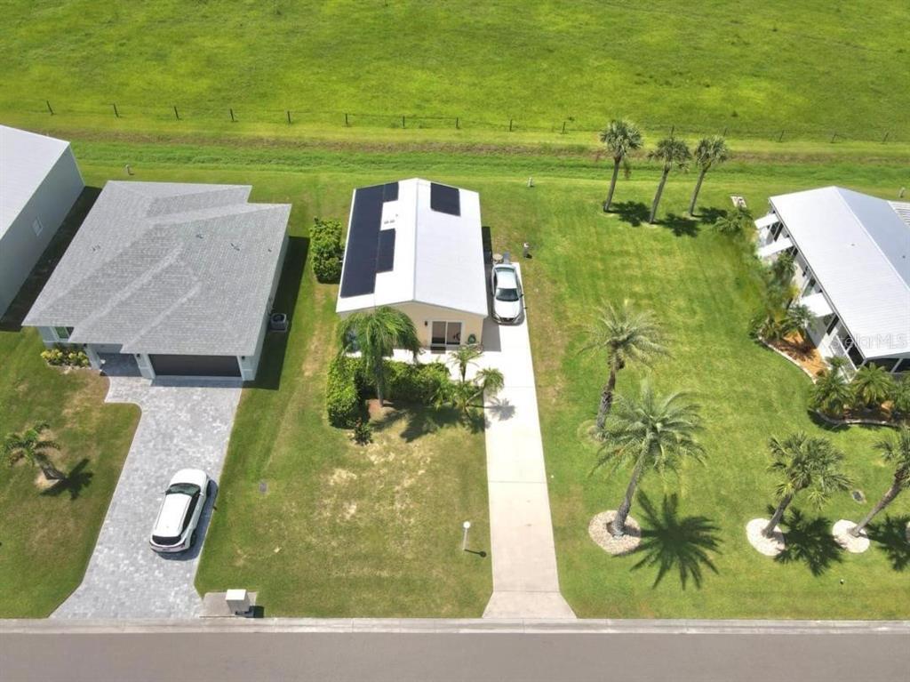 1000 Southwest 44th Boulevard Okeechobee, FL 34974 - Photo 2 of 11 an aerial view of a house with a ocean view