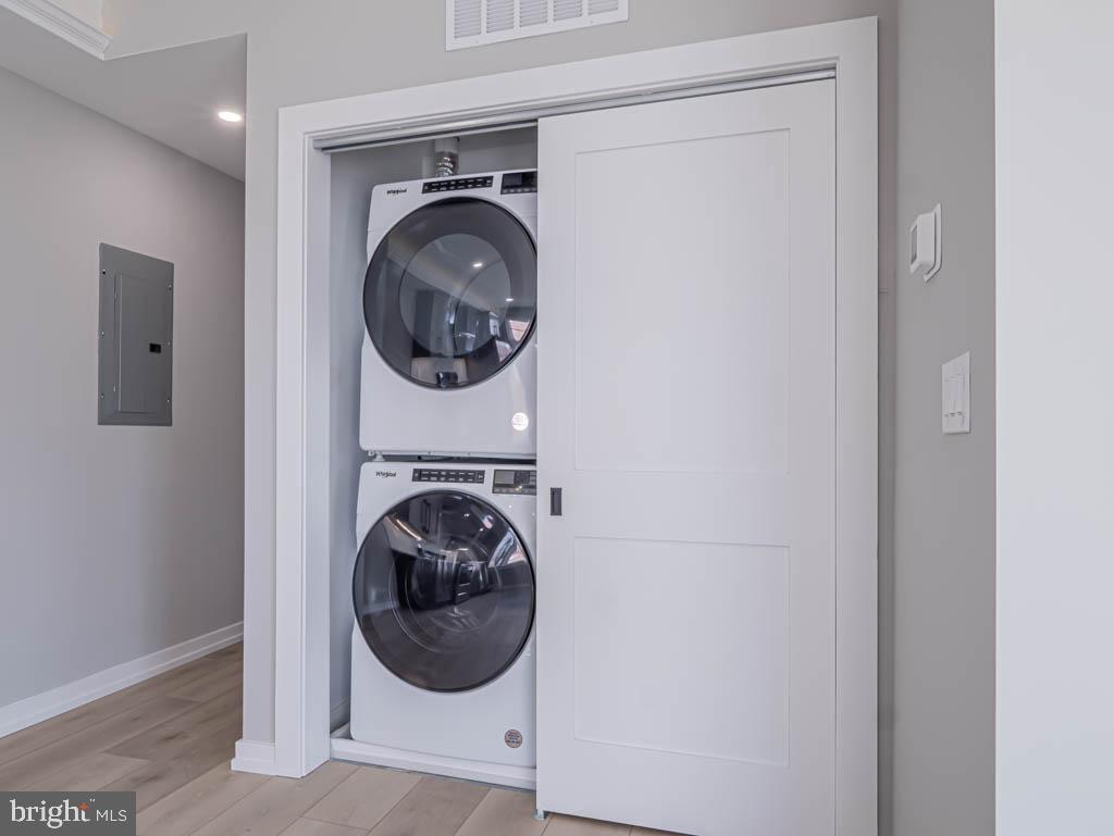769 South 10th Street, Unit 3D Philadelphia, PA 19147 - Photo 9 of 9 a close view of a utility room with dryer and washer
