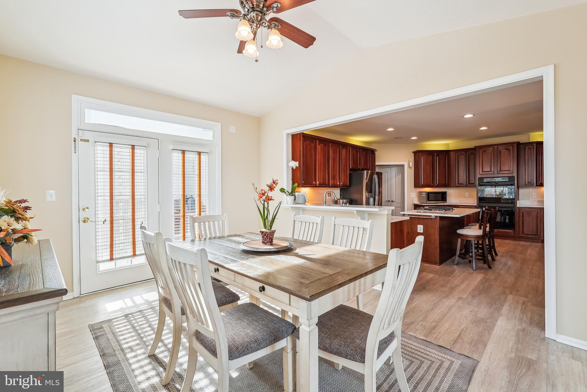42801 Ridgeway Drive Broadlands, VA 20148 - Photo 12 of 40 a view of a dining room with furniture