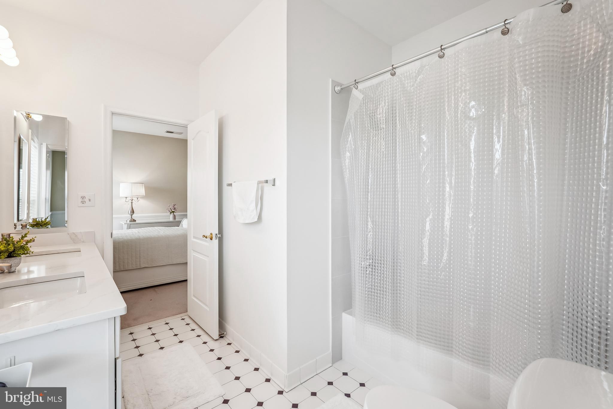42801 Ridgeway Drive Broadlands, VA 20148 - Photo 37 of 40 a bathroom with a sink toilet and shower