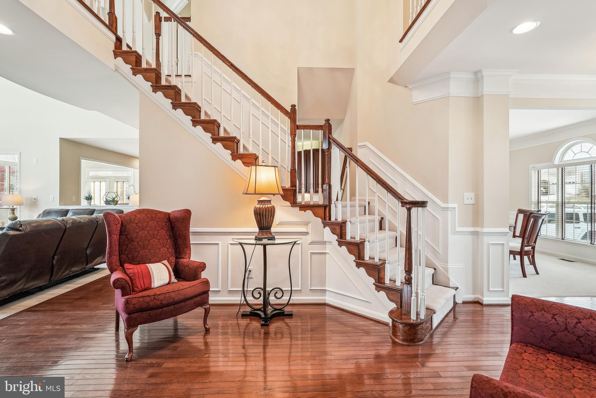 42801 Ridgeway Drive Broadlands, VA 20148 - Photo 4 of 40 a living room with furniture and wooden floor