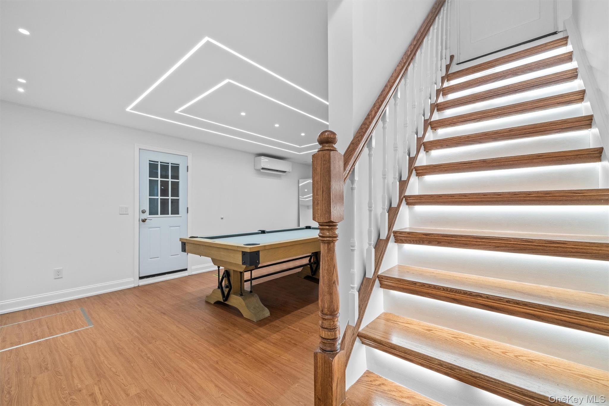 20 Whistler Road Scarsdale, NY 10583 - Photo 30 of 47 a view of entryway with wooden floor and stairs