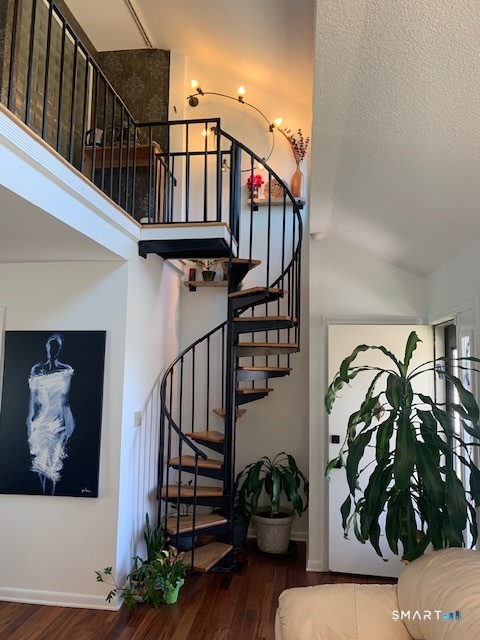 200 Brittany Farms Road, Unit D New Britain, CT 06053 - Photo 15 of 36 a view of entryway with wooden floor