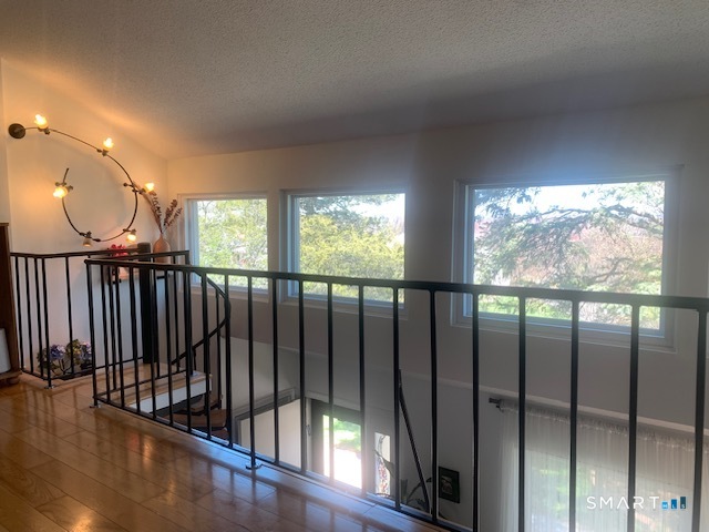 200 Brittany Farms Road, Unit D New Britain, CT 06053 - Photo 16 of 36 a view of stairs