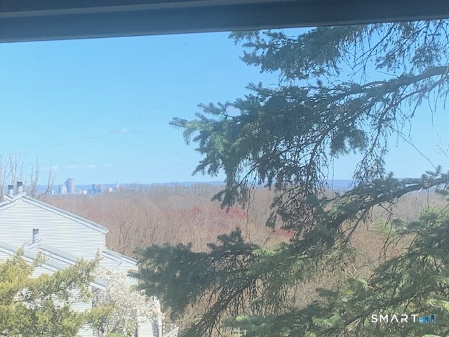 200 Brittany Farms Road, Unit D New Britain, CT 06053 - Photo 17 of 36 a view of a yard next to a lake