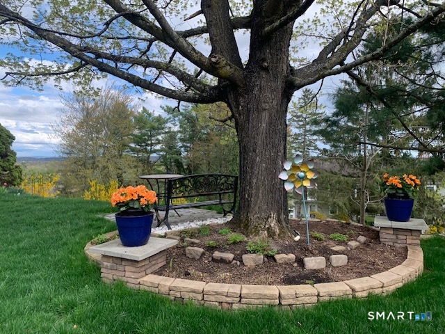200 Brittany Farms Road, Unit D New Britain, CT 06053 - Photo 34 of 36 a view of a fire pit with a tub