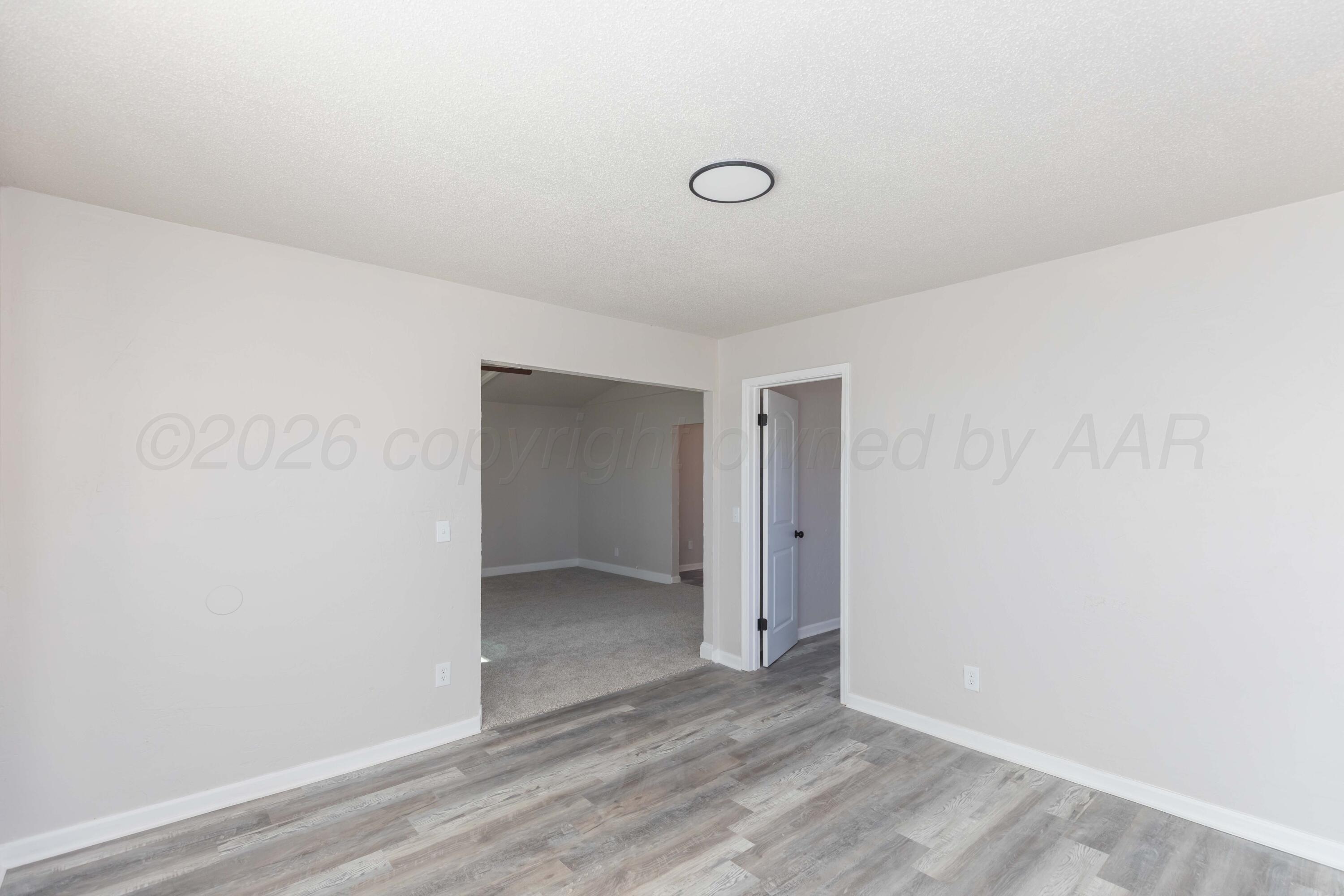 2915 Hodges Street Amarillo, TX 79103 - Photo 13 of 34 a view of an empty room