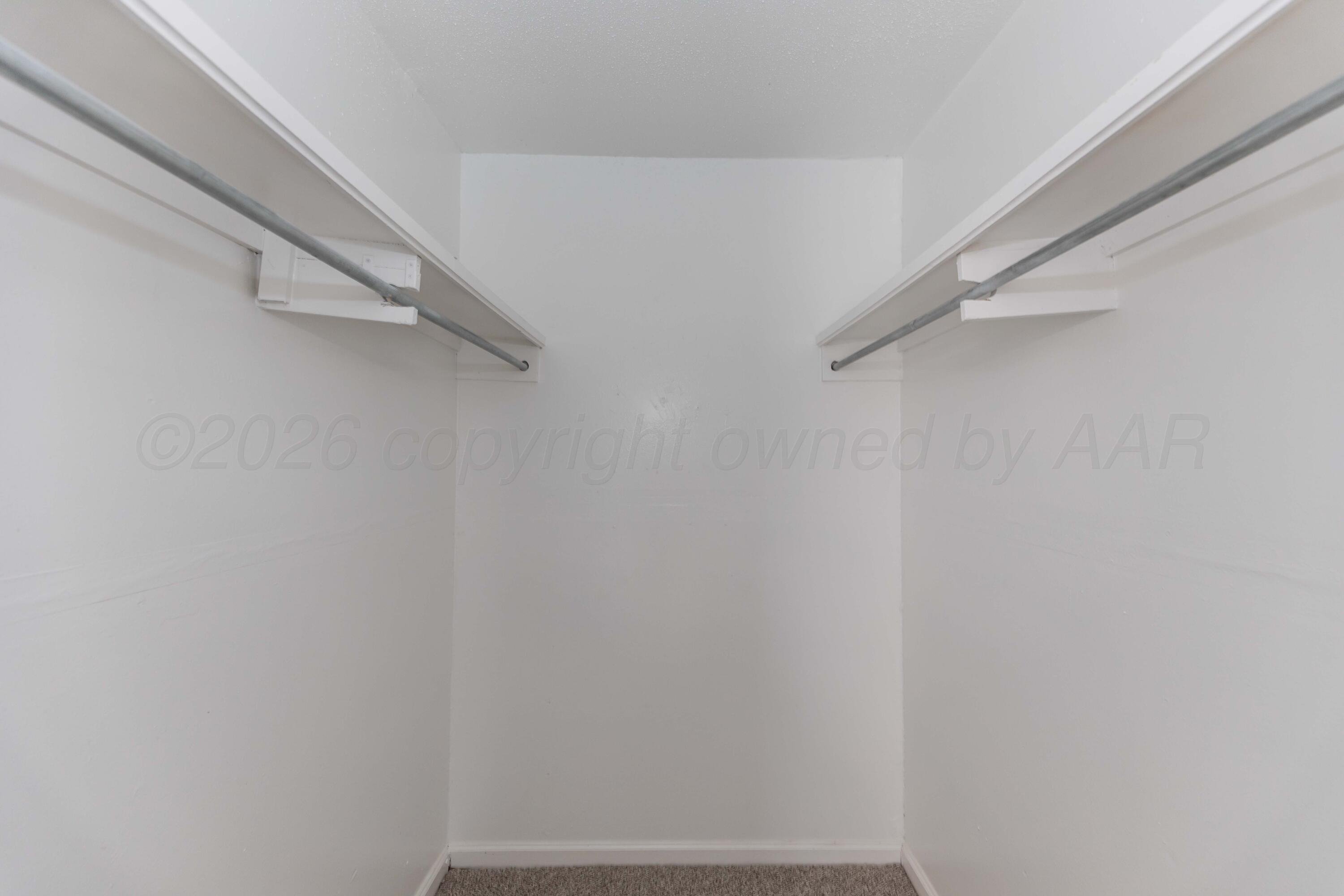 2915 Hodges Street Amarillo, TX 79103 - Photo 24 of 34 a view of an empty walk in closet