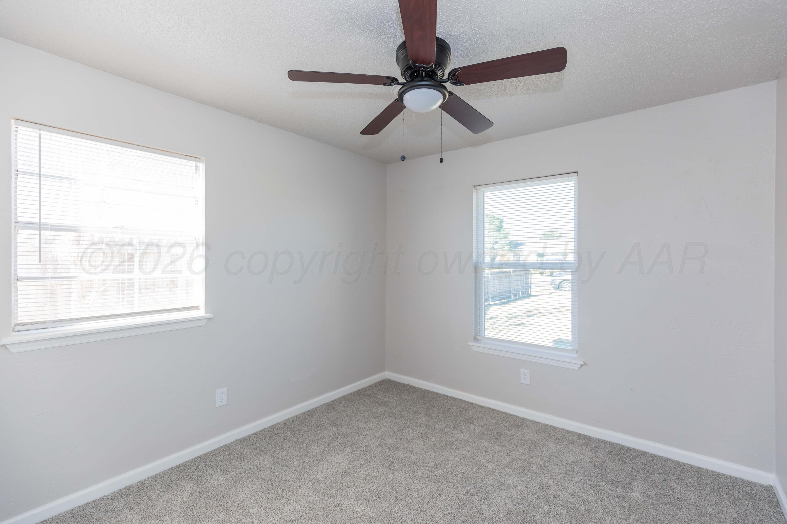 2915 Hodges Street Amarillo, TX 79103 - Photo 29 of 34 an empty room with a window