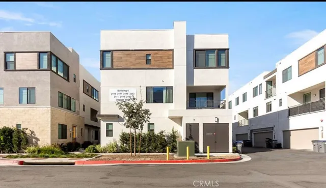 a front view of a building with a street