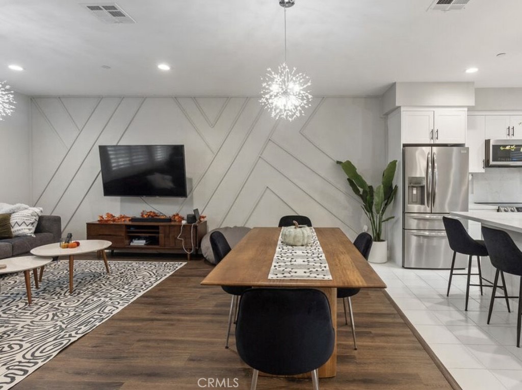 2111 Copper Walk Gardena, CA 90249 - Photo 17 of 33 a view of a livingroom with furniture and a flat screen tv