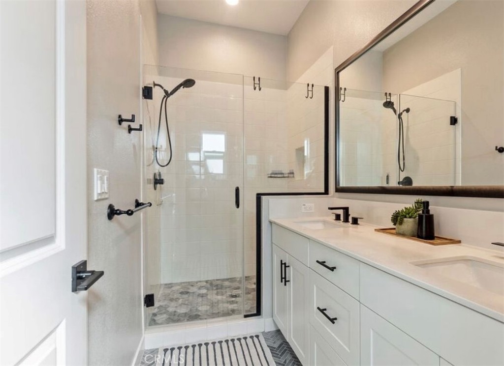 2111 Copper Walk Gardena, CA 90249 - Photo 22 of 33 a bathroom with a sink a toilet and shower