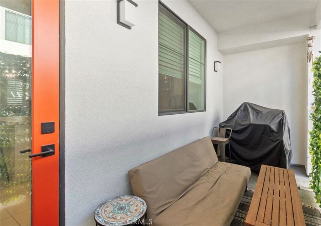 2111 Copper Walk Gardena, CA 90249 - Photo 33 of 33 a living room with furniture and a window