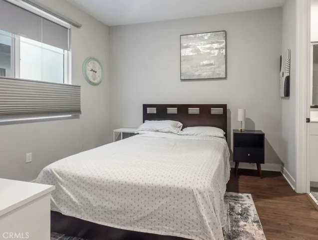 an empty room with wooden floor