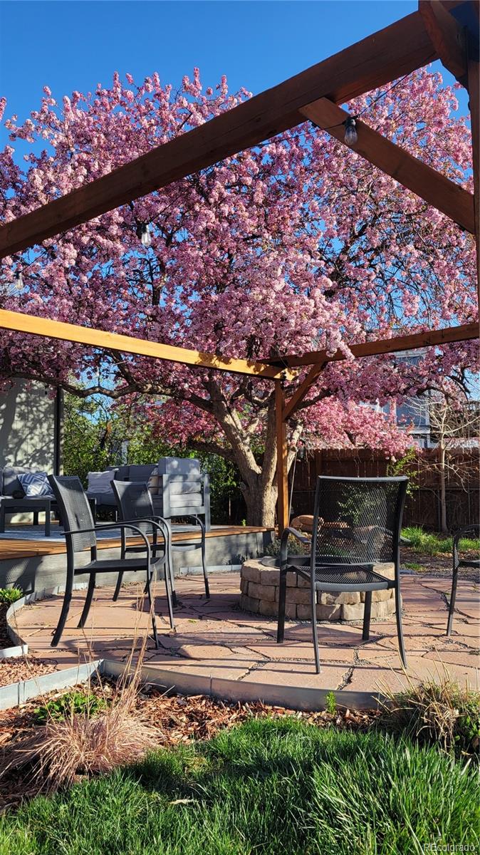 2102 Ridge Drive Broomfield, CO 80020 - Photo 31 of 35 a view of a patio with a table and chairs