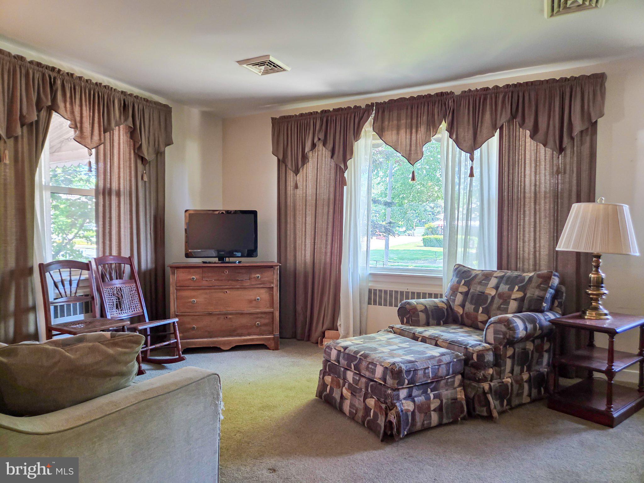 524 Locust Street Denver, PA 17517 - Photo 8 of 36 Cozy living space with natural light.