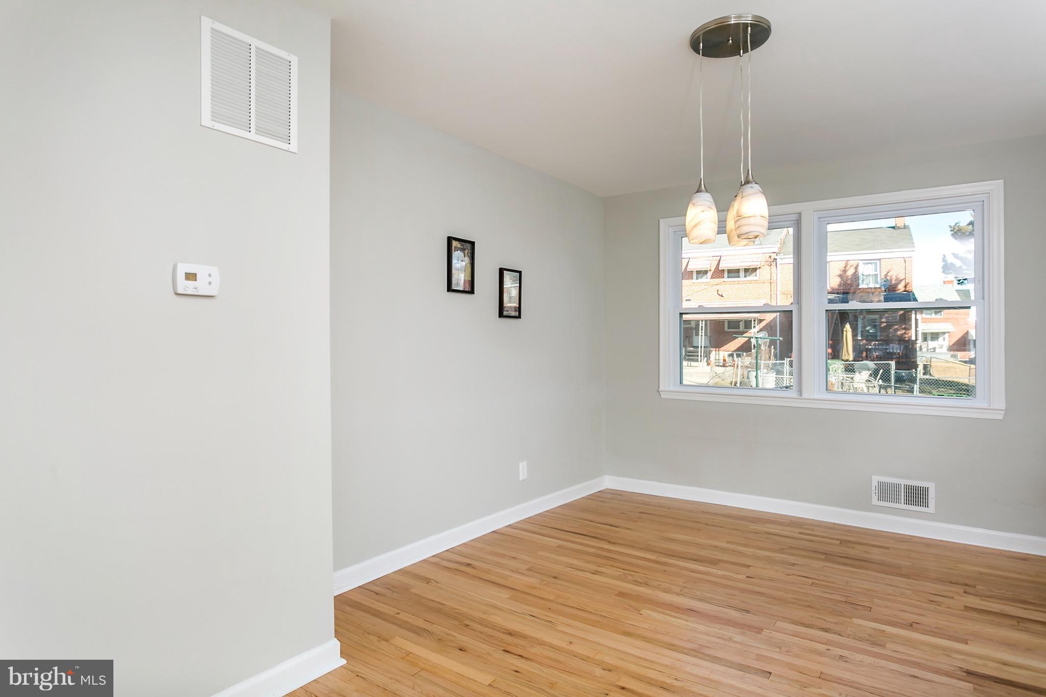 1232 Silverthorne Road Baltimore, MD 21239 - Photo 15 of 30 Dining Room