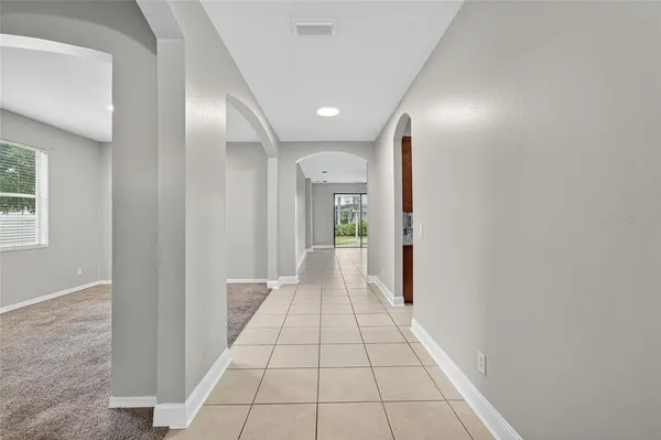 a kitchen with stainless steel appliances granite countertop a stove sink and microwave
