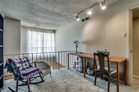 a view of a room with furniture window and wooden floor