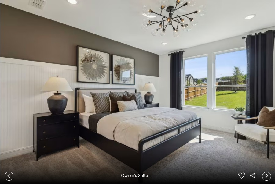 312 Celeste Way Liberty Hill, TX 78642 - Photo 11 of 15 a spacious bedroom with a bed and glass door