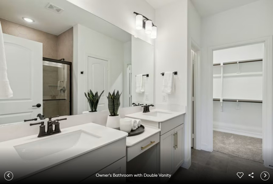 312 Celeste Way Liberty Hill, TX 78642 - Photo 12 of 15 a bathroom with a sink and a mirror