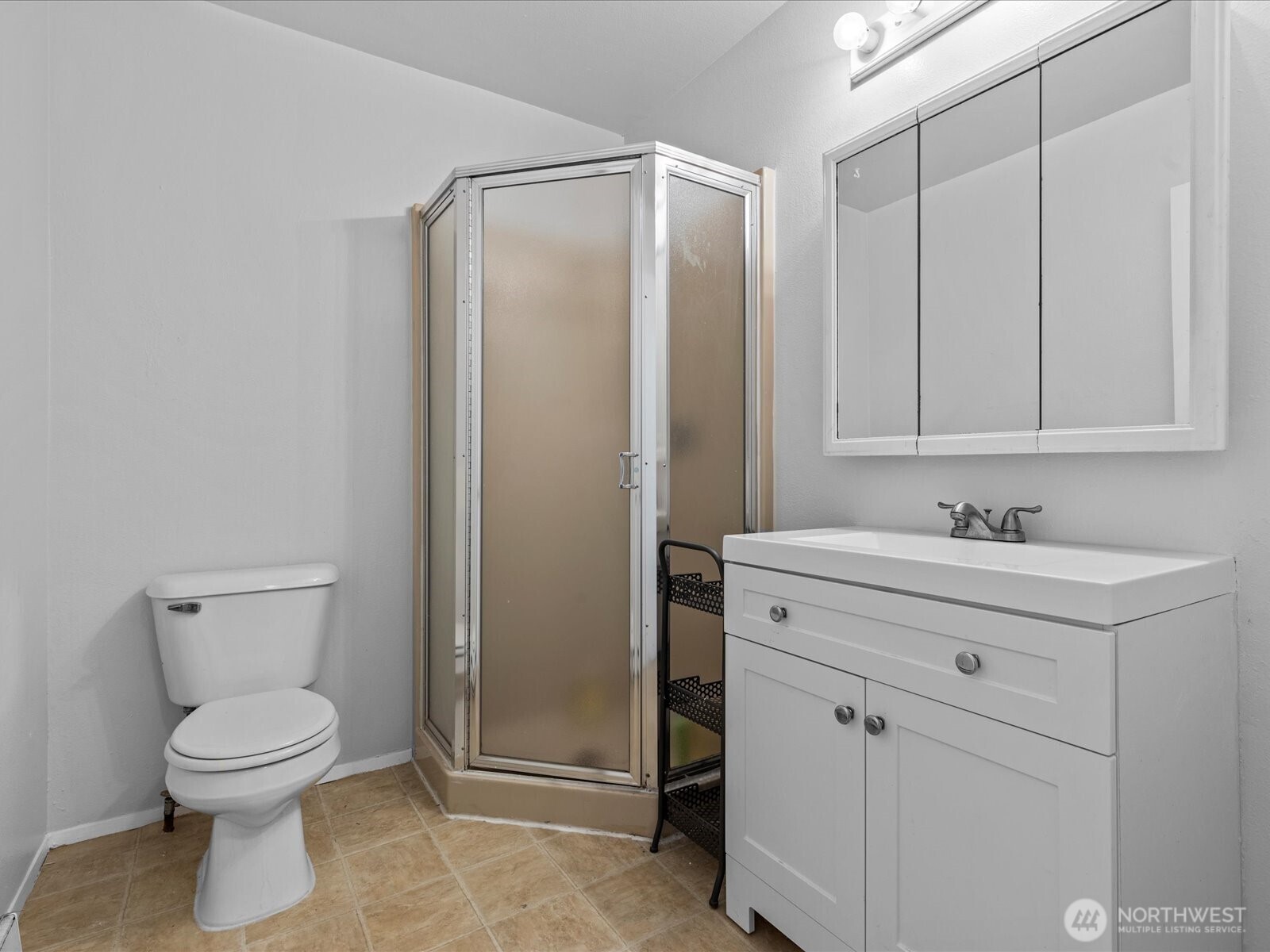 6507 Cady Road Everett, WA 98203 - Photo 24 of 29 a bathroom with a sink a toilet and vanity